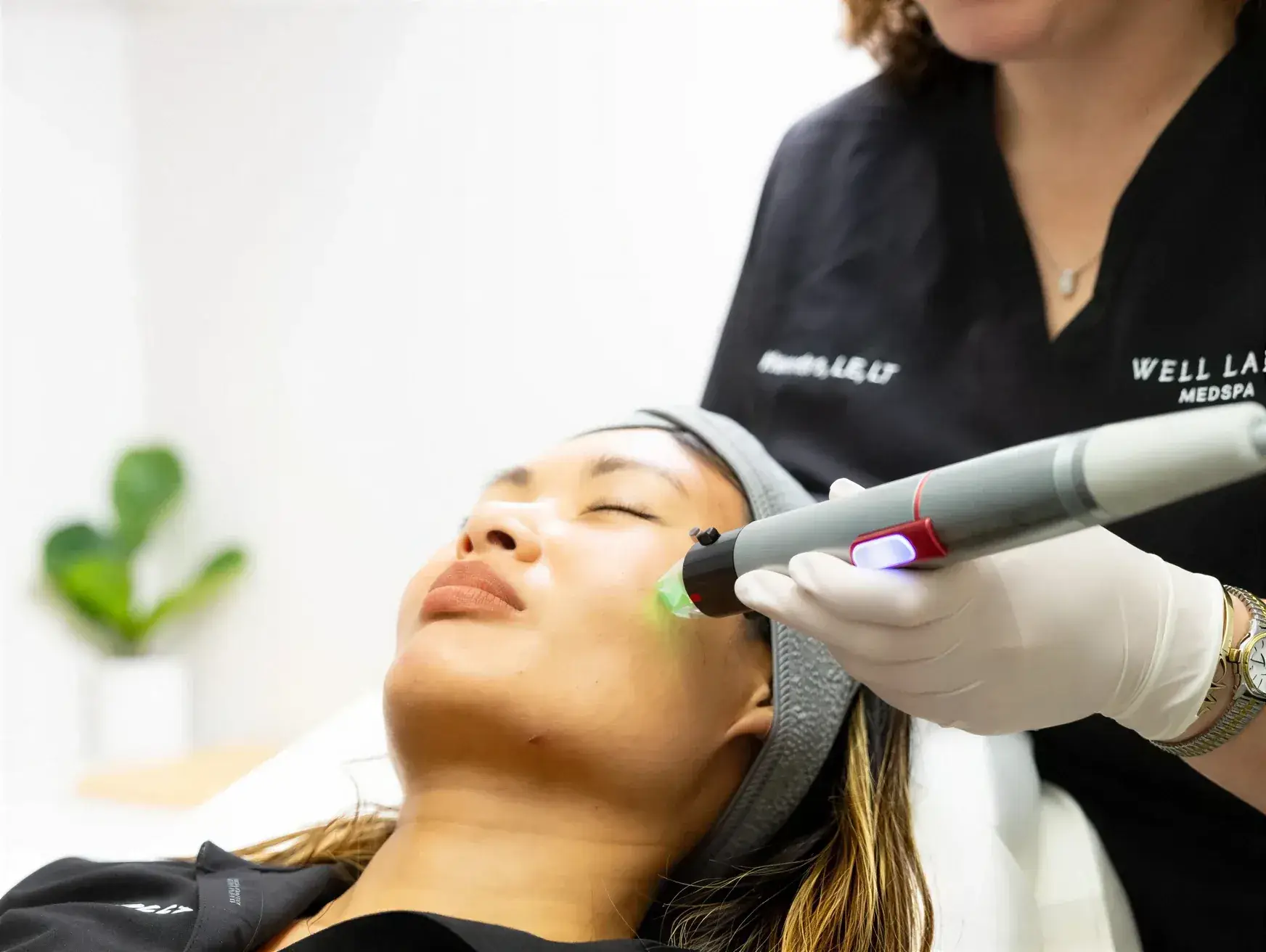 A Well Labs Medspa provider performing an Ariessence PDGF facial treatment on a reclining client