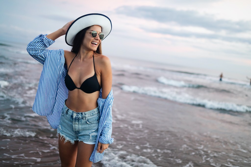Beautiful woman on the beach during summer vacation