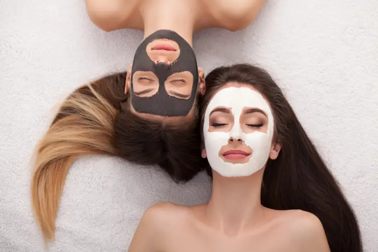 Flat lay of skincare products like serums and masks used during a facial, emphasizing personalized skin treatments.