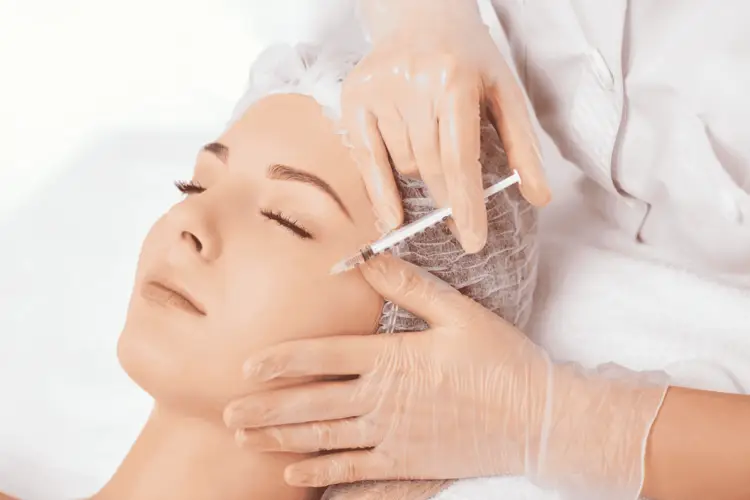 Med spa specialist applying Botox during a medical aesthetic procedure